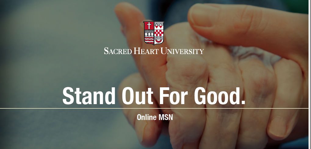 A person 's hand is shown in front of the sacred heart university logo.