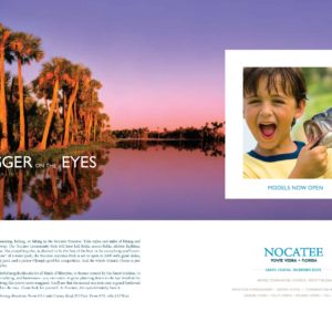 A picture of a boy holding his fish in front of the water.